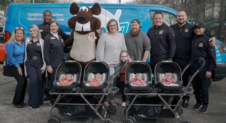 Beaver colleagues at a community event