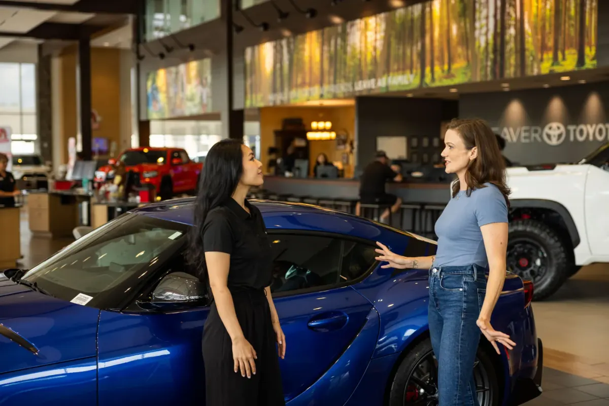 A Beaver client advisor with a customer in our Toyota showroom